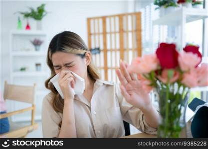 Woman sneezing in tissue due to allergy to pollen