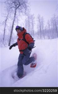 Woman Snowshoeing Fast