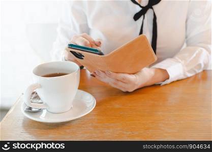 woman social media with cup of coffee