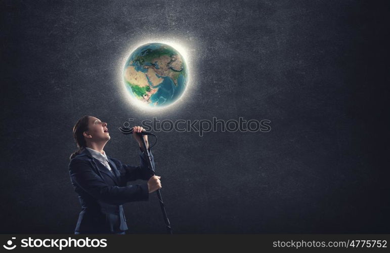 Woman speaker. Woman reporter with microphone gesturing with hand. Elements of this image are furnished by NASA