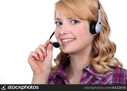 Woman speaking into a headset