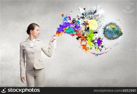 Woman spraying paint. Young businesswoman with suitcase in hand using spray balloon. Elements of this image are furnished by NASA
