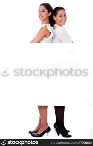 Woman stabding back to back on isolated white background