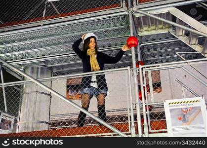 Woman standing against a railing