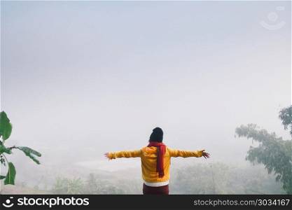 woman standing among mist to freedom. woman among mist to freedom