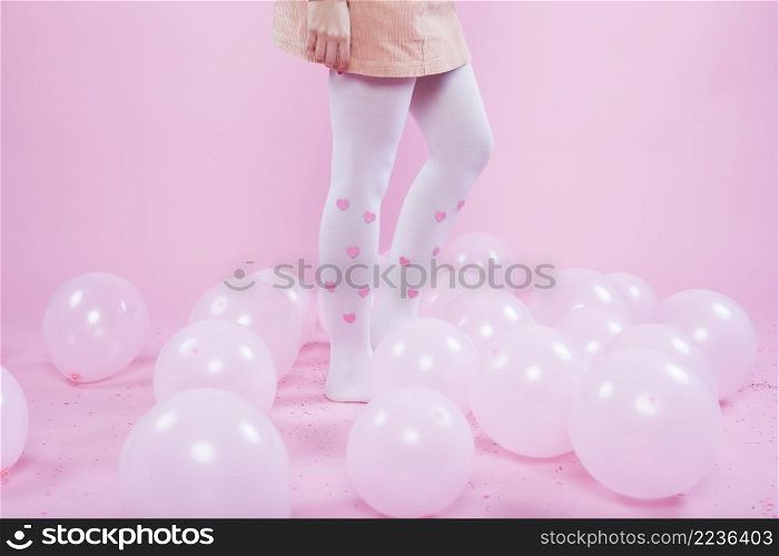woman standing floor with balloons
