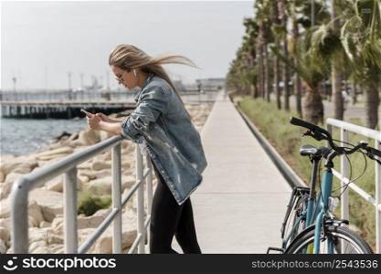 woman standing her bike 3