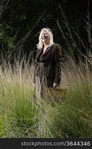 Woman Standing in a Field