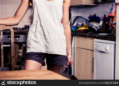 Woman standing in a kitchen