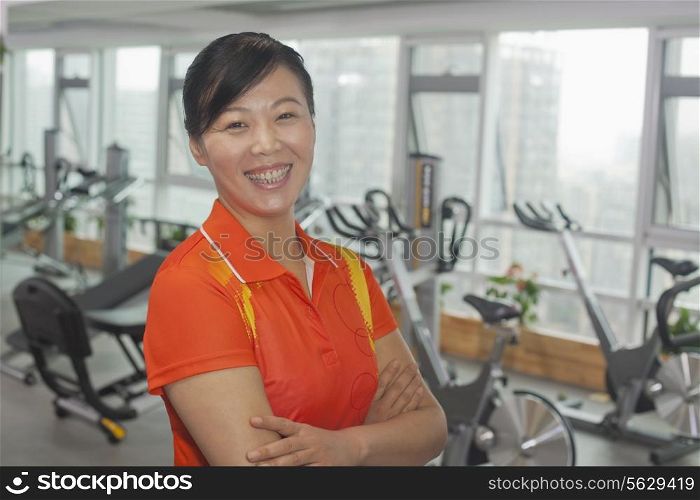 Woman standing in the gym