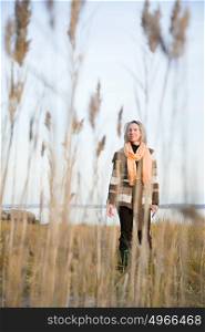 Woman standing on marshland