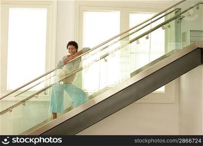 Woman Standing on Modern Stairway