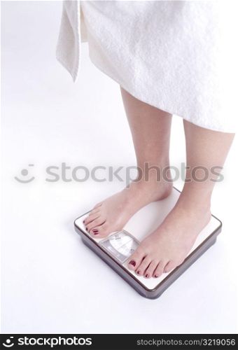 Woman Standing on Scale