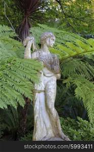 Woman statue in the forest at Quinta da Regaleira, Sintra, Portugal&#xA;