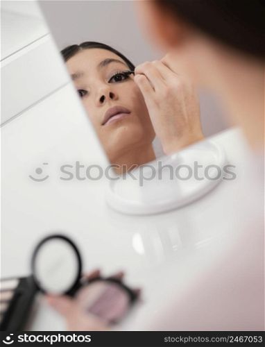 woman staying home using make up 3