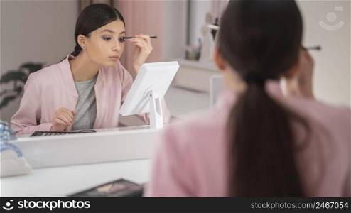 woman staying home using make up 4