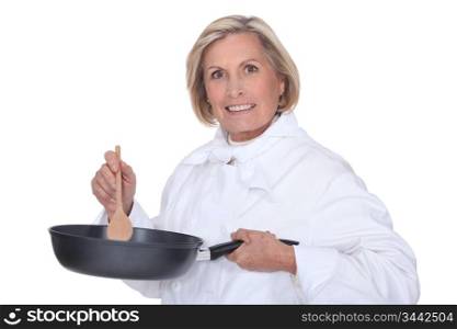 Woman stirring sauce