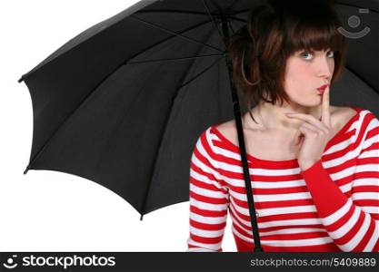 Woman stood with umbrella