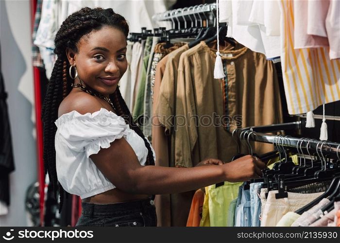 woman store checking clothes