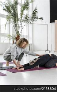 woman stretching mat