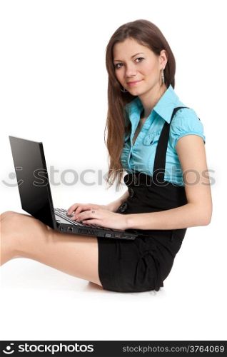 Woman student sitting with laptop isolated on white background.