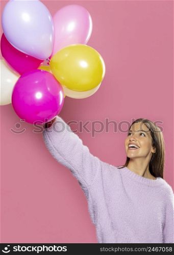 woman studio having fun with balloons 2