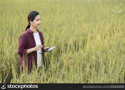 woman studying different plants with copy space