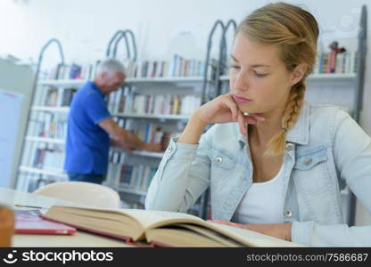 woman studying in the library