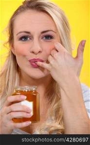 woman sucking her finger