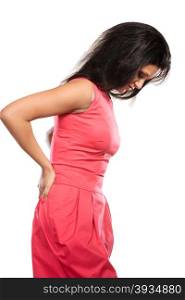 Woman suffering from backache back pain.. Mixed race woman suffering from backache back pain. Young girl isolated on white.