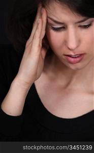 Woman suffering from headache