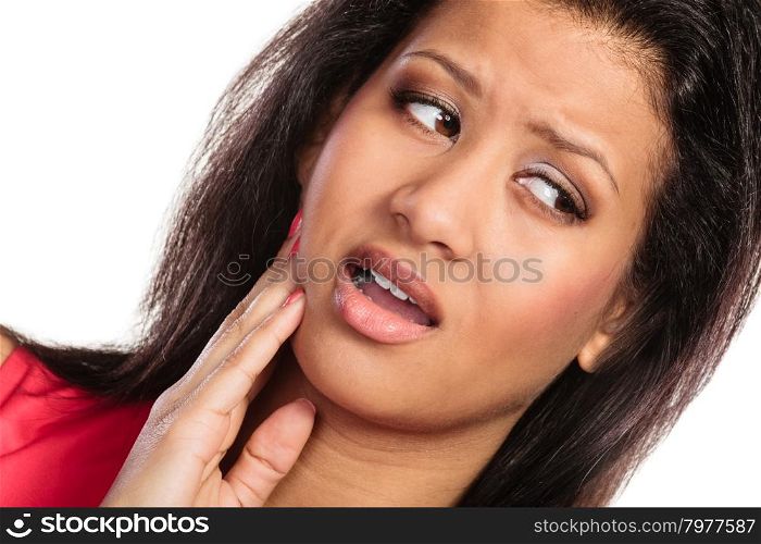 Woman suffering from toothache tooth pain.. Mixed race woman suffering from toothache tooth pain. Young girl isolated on white.
