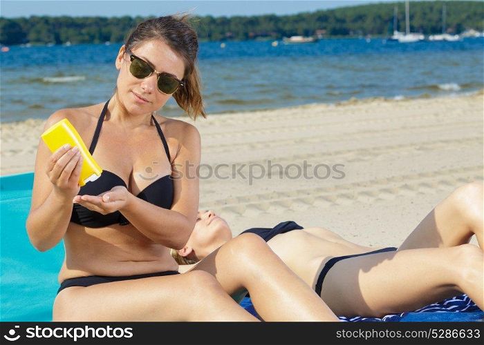 woman sunbathing on the beach