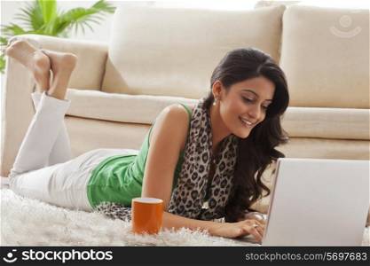 Woman surfing the net on a laptop