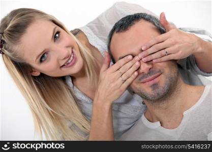 woman surprising her boyfriend