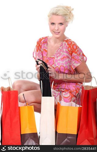 Woman surrounded by bags