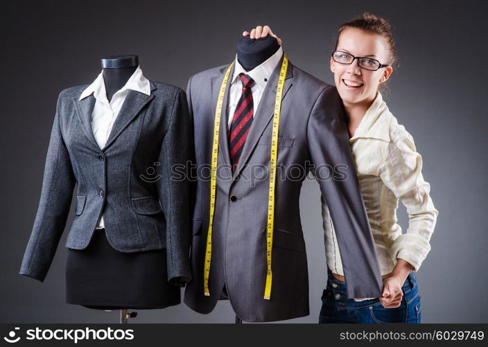 Woman tailor working on clothing