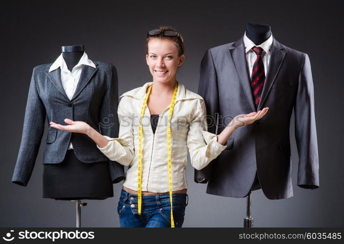 Woman tailor working on clothing