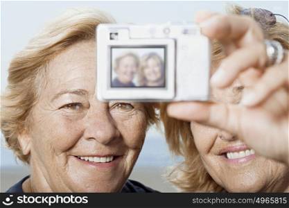 Woman taking a picture of themselves