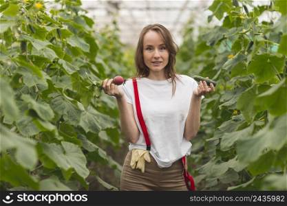 woman taking care plants greenhouse 2