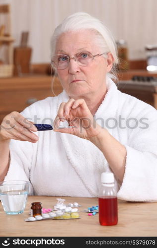 Woman taking her medication
