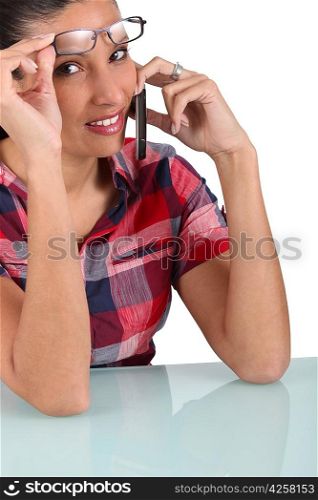 Woman taking off her glasses