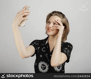 woman taking selfie