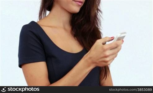 Woman talking on her smart phone.Clerk on mobile conversation.Female phone conversation at work.Corporate Business scene with an employee holding a phone conversation.Cellular phone chatting on white background.