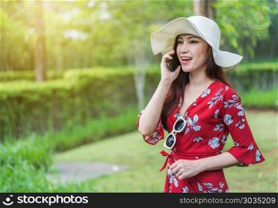 woman talking on mobile phone . beautiful woman talking on a mobile phone