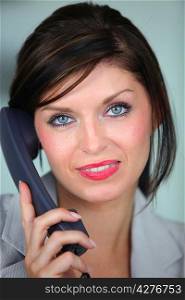 Woman talking on the telephone