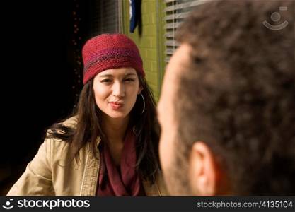 Woman Talking to Man