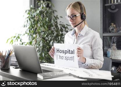woman teaching her students definition hospital