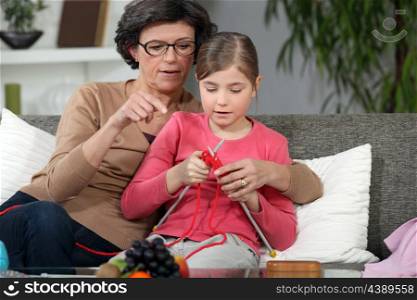 Woman teaching how to knit