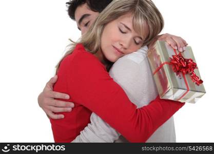 Woman thanking her boyfriend for his gift
